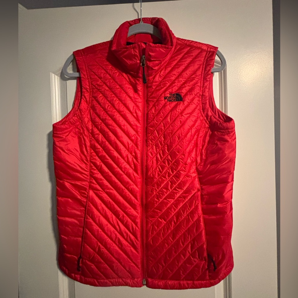 North Face women’s red puffer vest size medium